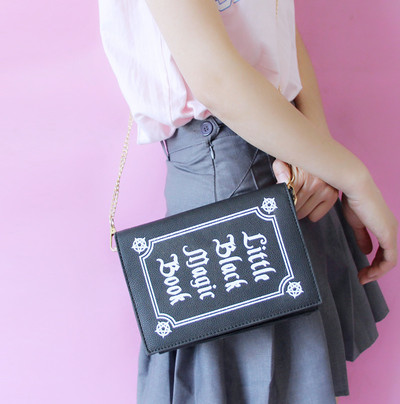 Magic book shaped shoulder bag 