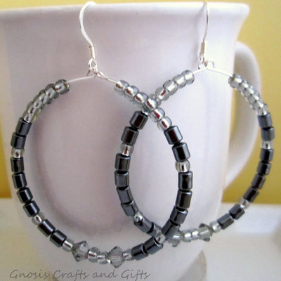 Beaded hippie gypsy memory wire hoop earrings with hematite and swarovski beads.