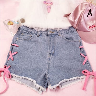 Pink lace up denim shorts