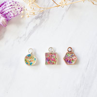 Real Dried Flowers in Resin Necklace, Small Black Triangle in Red Orange Yellow - Thumbnail 2