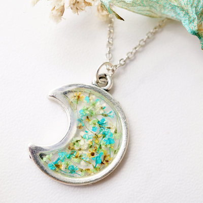 Real dried flowers and resin necklace, silver moon in teal green yellow