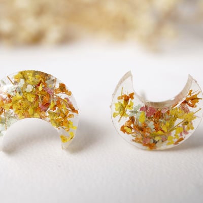 Real dried flowers and resin moon stud earrings in yellow orange mint