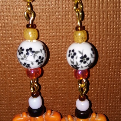 Orange black and white; butterfly theme earrings