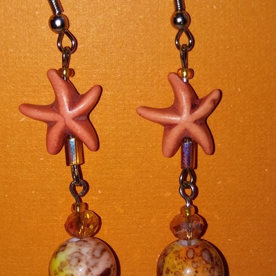 Salmon splatterpaint and orange starfish earrings