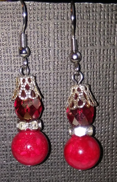 Red faceted and marble capped Earrings