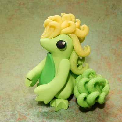 Yellow and green maned dragon - Thumbnail 1