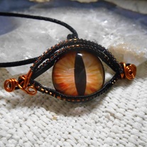 Orange and black dragons eye necklace
