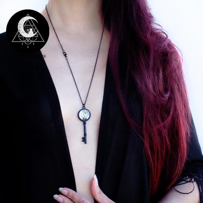 Black key crystal ball necklace