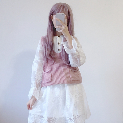 White lace skirt and pink knitted vest