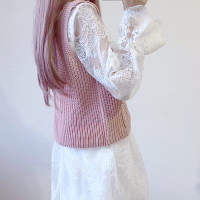 White lace skirt and pink knitted vest 