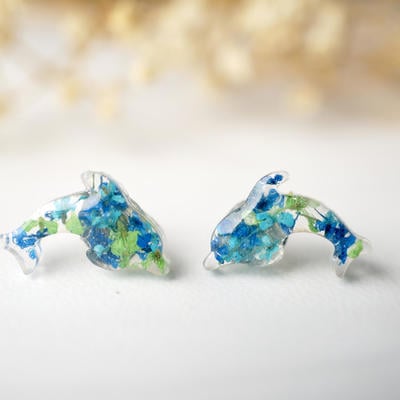 Real dried flowers and resin dolphin stud earrings in greens and blues