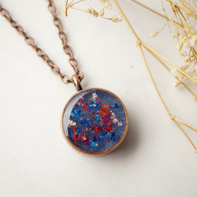 Real dried flowers in resin necklace, thick copper circle in blue pink red