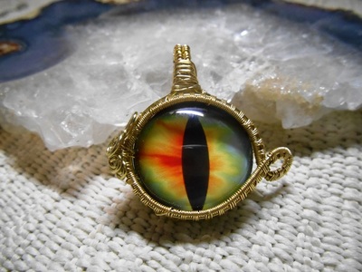 Multicolor and goldtone dragons eye necklace