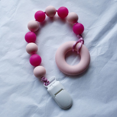 Pacifier teething clip