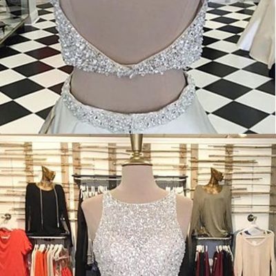 Grey open back prom dresses ,glitter halter top, bare midriff, flowing solid silk skirt.