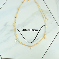 Two Layers Star and Moon Necklace in Silver and Gold - Thumbnail 1