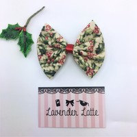 Christmas Holly Print Fabric Medium Hair Bow with Gold Metallic Detail and Red Ribbon - Thumbnail 1