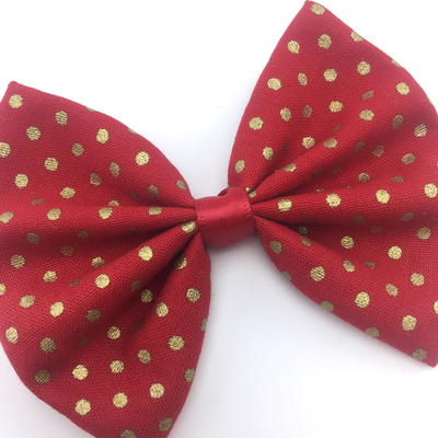 Red with gold dots christmas print fabric medium hair bow with gold metallic detail - Thumbnail 1