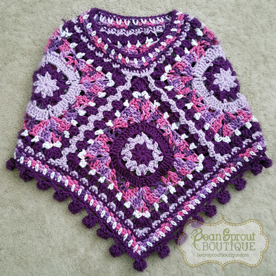 Pompom poncho (rts)