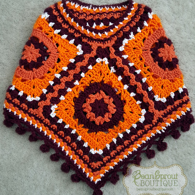 Pompom poncho (rts)