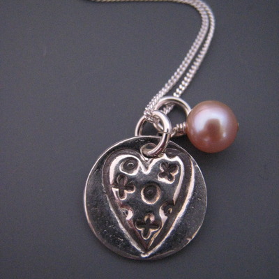 Love and kisses necklace