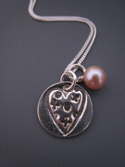Love and kisses necklace