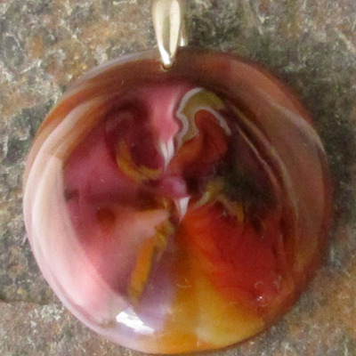Salmon pink and cinnabar glass pendant