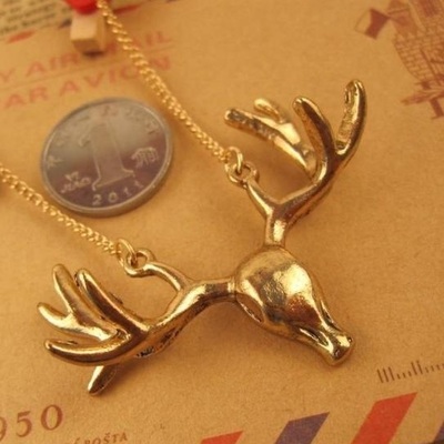 Golden delicate deer antler necklace