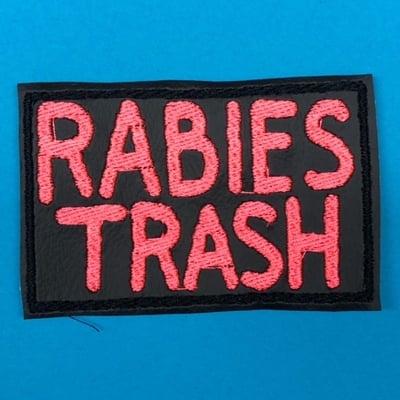 Rabies trash embroidered patch pink