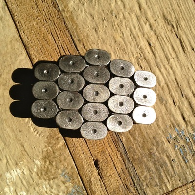 Silver oval knockout belt buckle by citizen objects