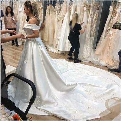 A-line off-the-shoulder court train satin wedding dress with appliques
