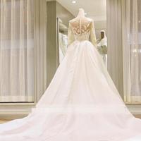  Generous Lace Applique A-Line Wedding Dresses Jewel Long Sleeve Cathedral Train Bridal Dresses With Covered Buttons Back Wedding Gowns - Thumbnail 1