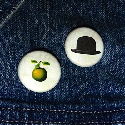 Apple + bowler = dynamic duo buttons