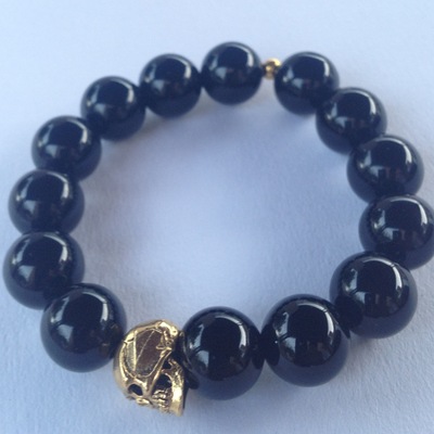 Golden onyx skull bracelet
