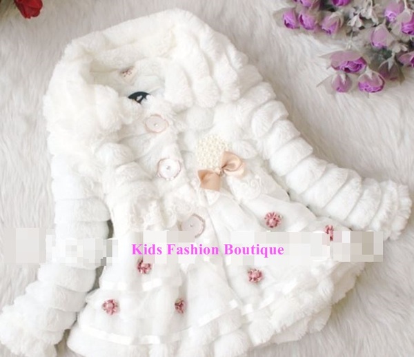 Girls White Fur Coat adorned with beautiful flowers.