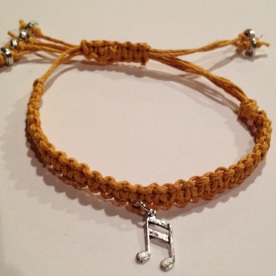 Friendship bracelet - gold w/ musical note charm
