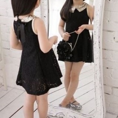 Girls classy little black dress. 100% cotton.