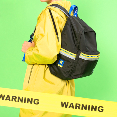 "warning" tape backpack