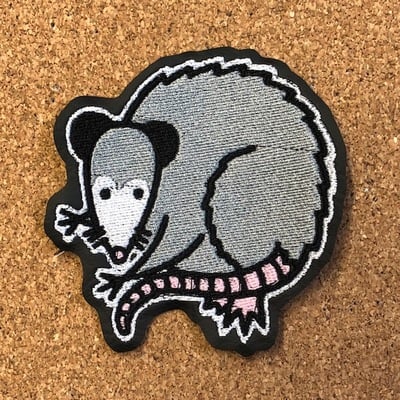 Possum patch facing right