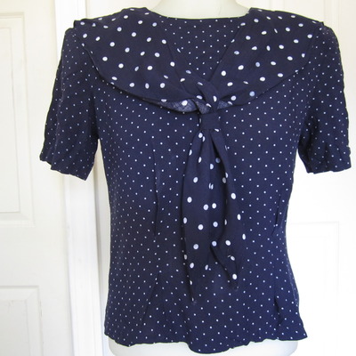 Sold dotty top 