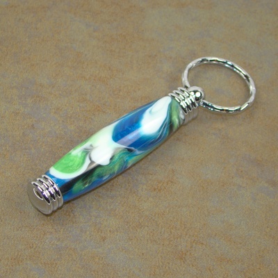 Blue, green, black, and white acrylic keychain