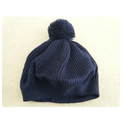 Dark blue beret with pom pom
