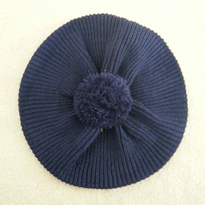 Dark blue beret with pom pom