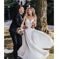 New Boho Wedding Dresses V-neck Spaghetti Straps Sleeveless White Ivory Chiffon Beach Bridal Dress Appliques Backless Vestido De Noiva - Thumbnail 1