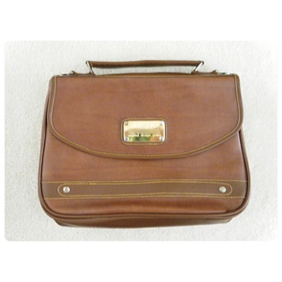 Thrifted brown bag with detachable straps