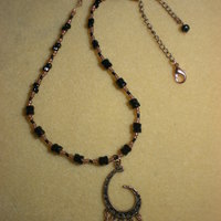 Copper and black Moon Swirl Necklace - Thumbnail 1