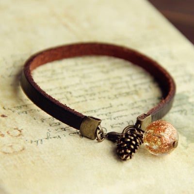 Pinecone and orb leather bracelet