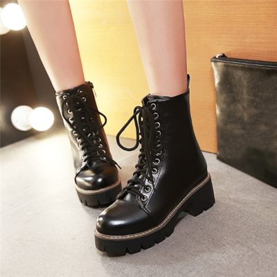 Lace up platform biker boots in black and white