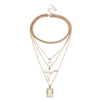 CROSS AND GUN MULTI LAYER NECKLACES - Thumbnail 1
