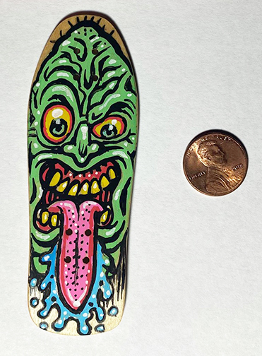  "Green Freak" Hand Painted wooden fingerboard signed by the artist